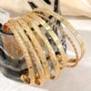 conjunto de 7 pulseras doradas boho chic