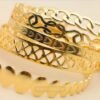 5 pulseras doradas diseño orientar medio